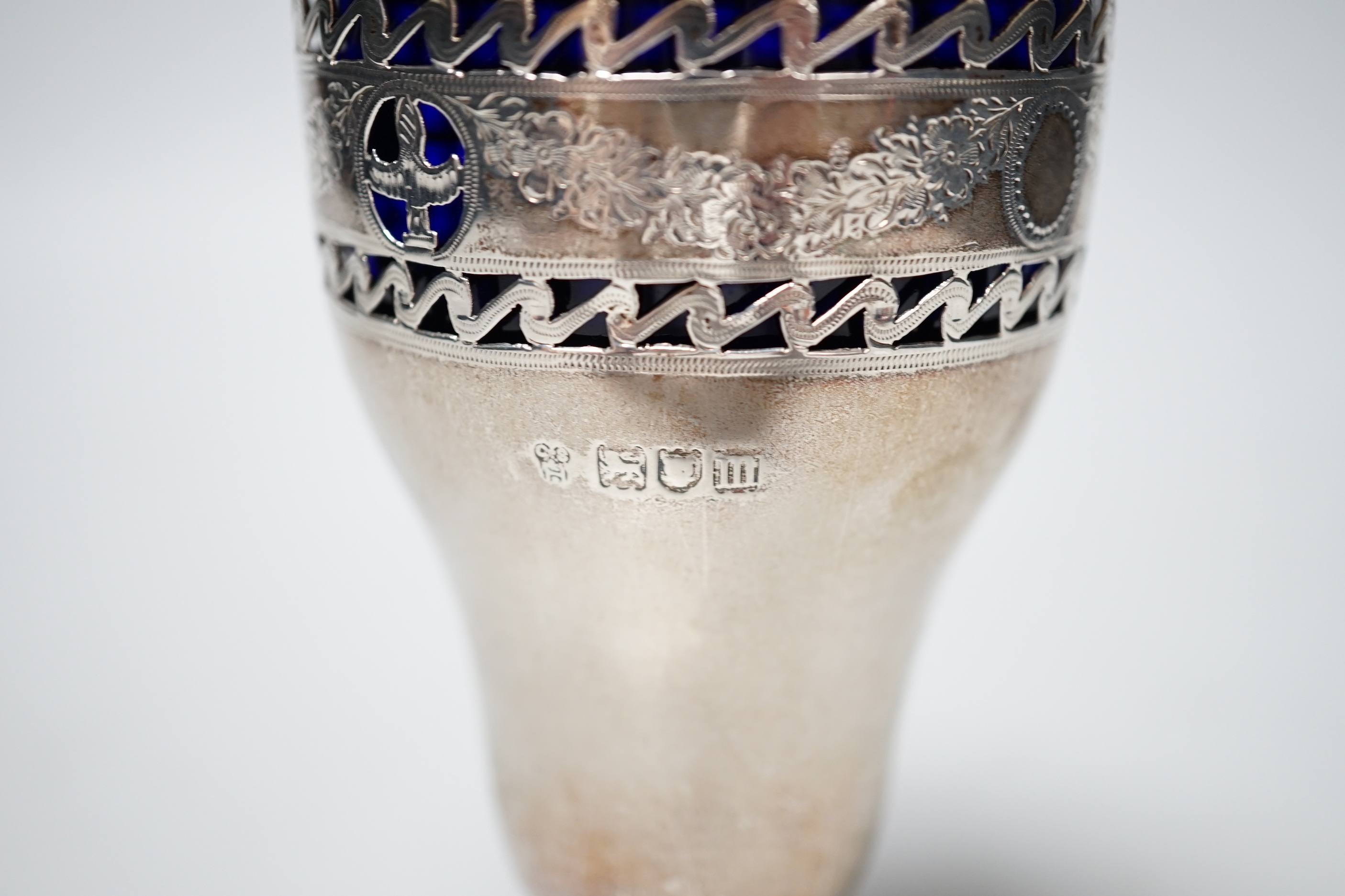 An Edwardian pierced silver sugar sifter, with blue glass liner, Charles Stuart Harris & Sons, London, 1907, 15.2cm.